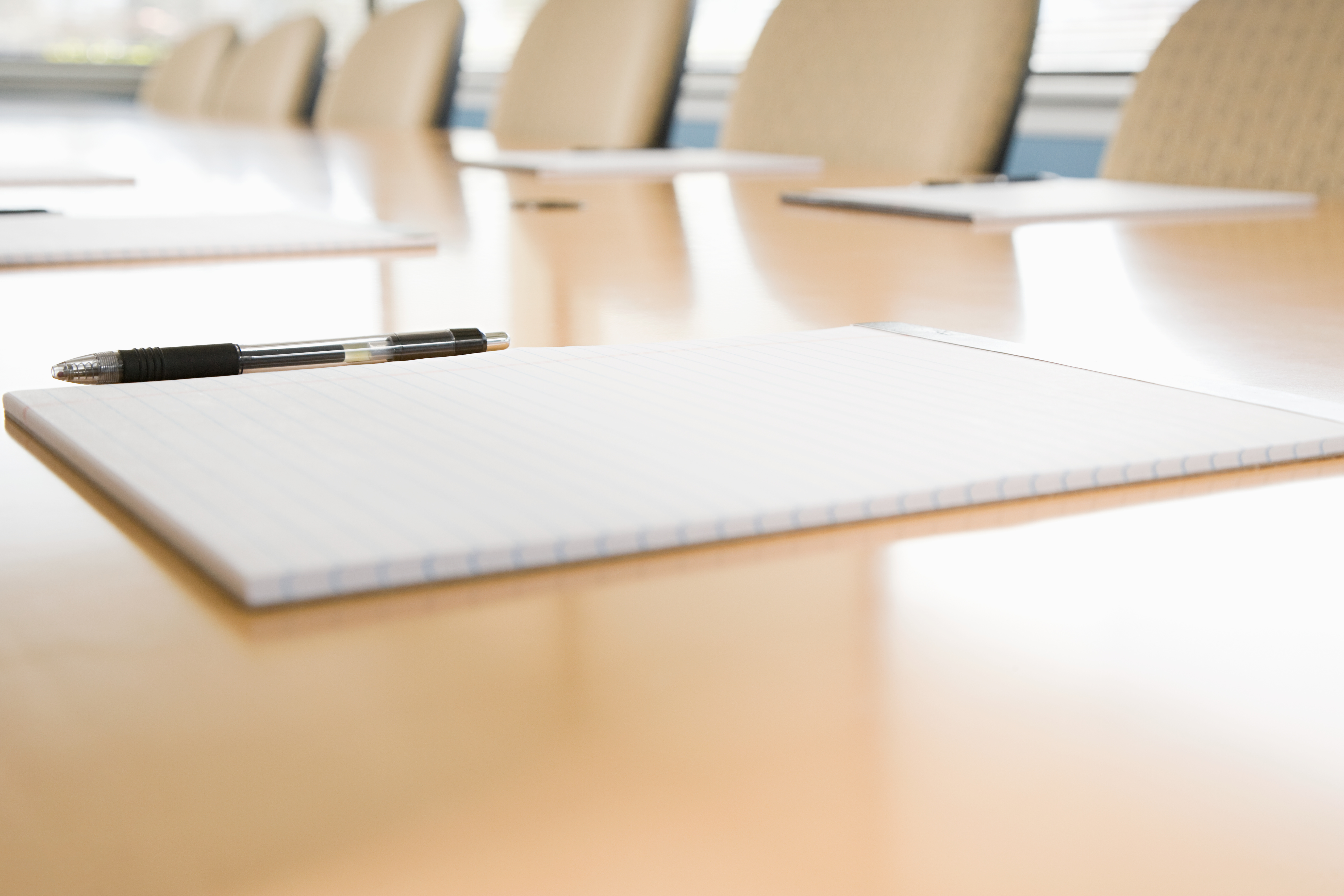 Notepads on the conference table