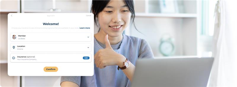 a young asian woman is showing a thumb up 